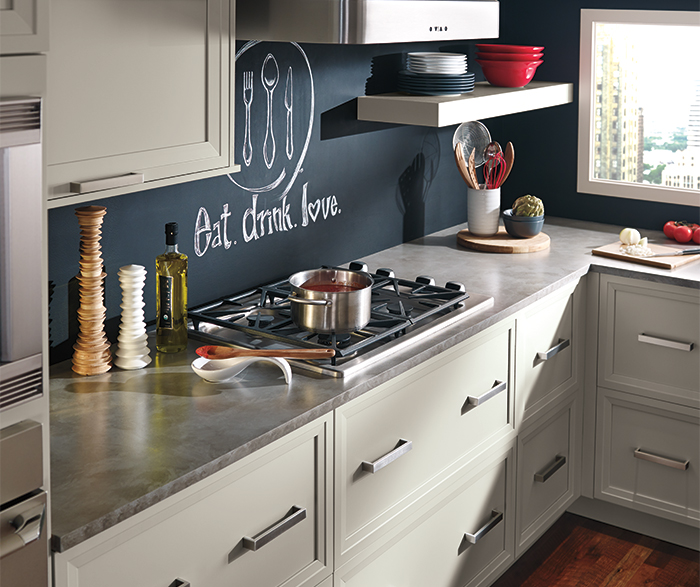 Grey cabinets in casual kitchen by Kitchen Craft Cabinetry
