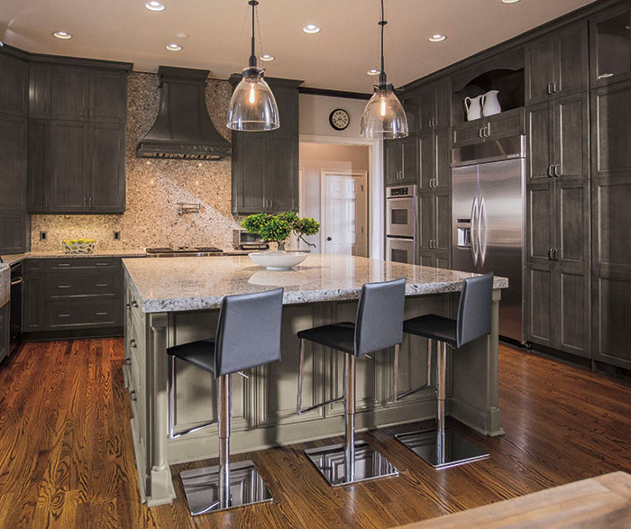 Casual grey kitchen cabinets by Kitchen Craft Cabinetry