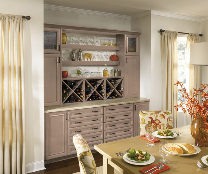 Dining room cabinets in light grey finish by Kitchen Craft Cabinetry