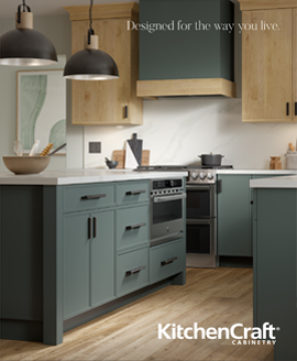 neutral kitchen with white and wooden cabinetry surrounding grey slab island
